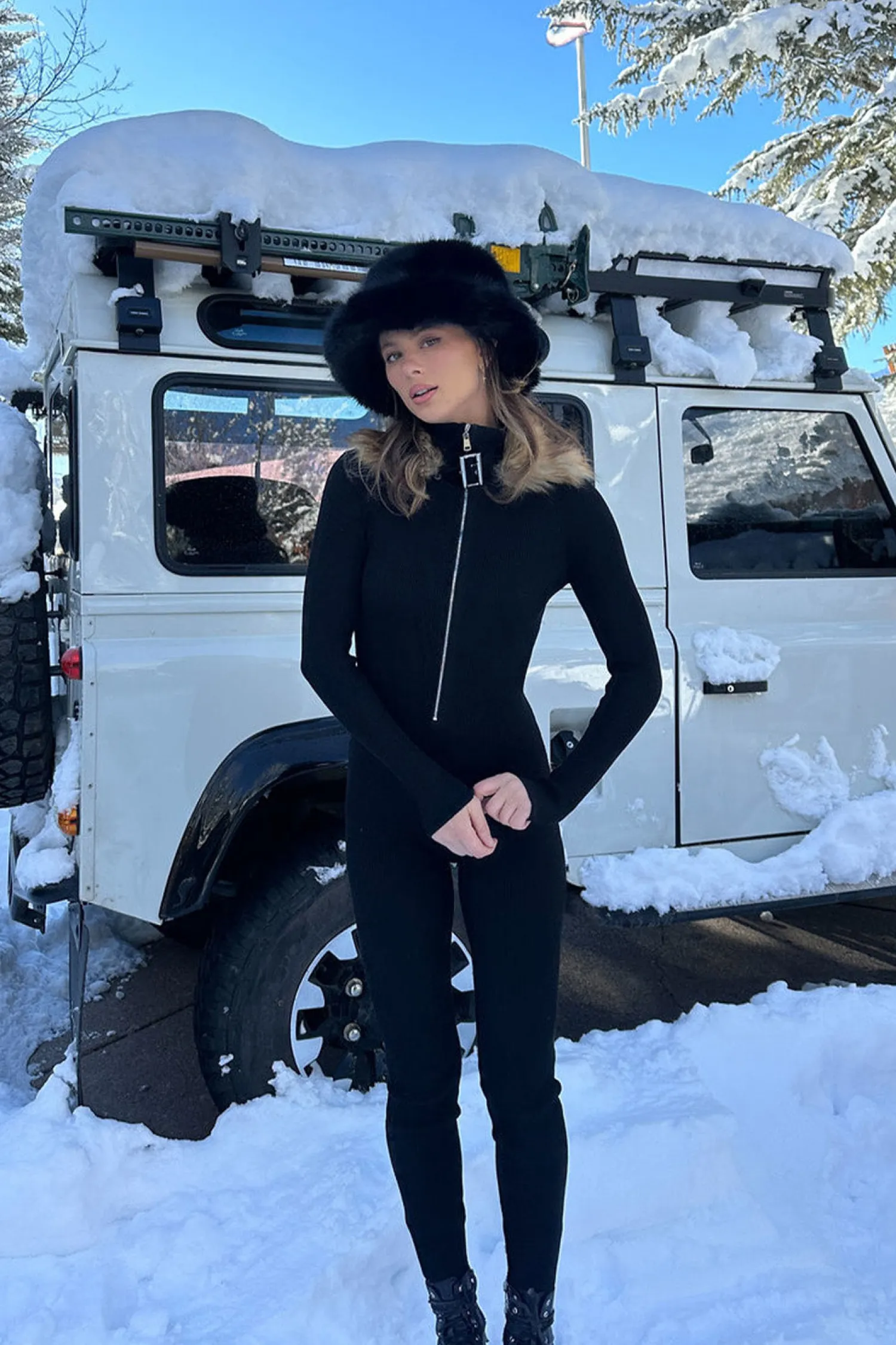 Fashion Apres Faux Fur Trimmed Black Ribbed Knit Jumpsuit Jumpsuits + Rompers