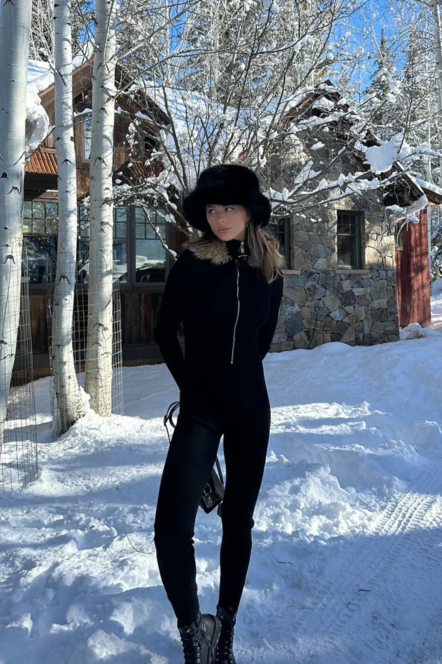 Fashion Apres Faux Fur Trimmed Black Ribbed Knit Jumpsuit Jumpsuits + Rompers