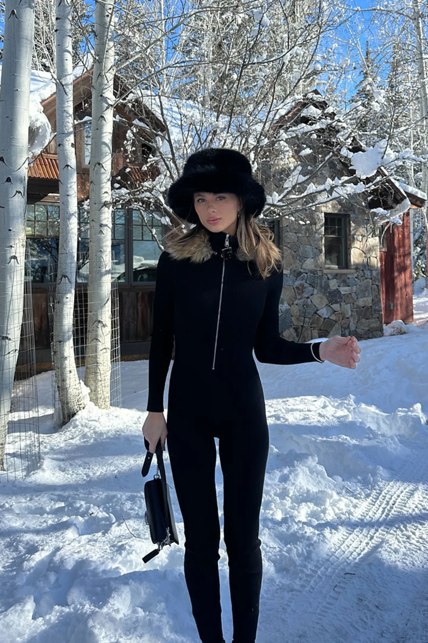 Fashion Apres Faux Fur Trimmed Black Ribbed Knit Jumpsuit Jumpsuits + Rompers